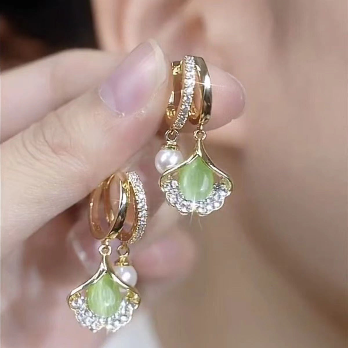 【Kupte 1 a získejte 1 zdarma】 Náušnice s ginkgo listem Cat Eye